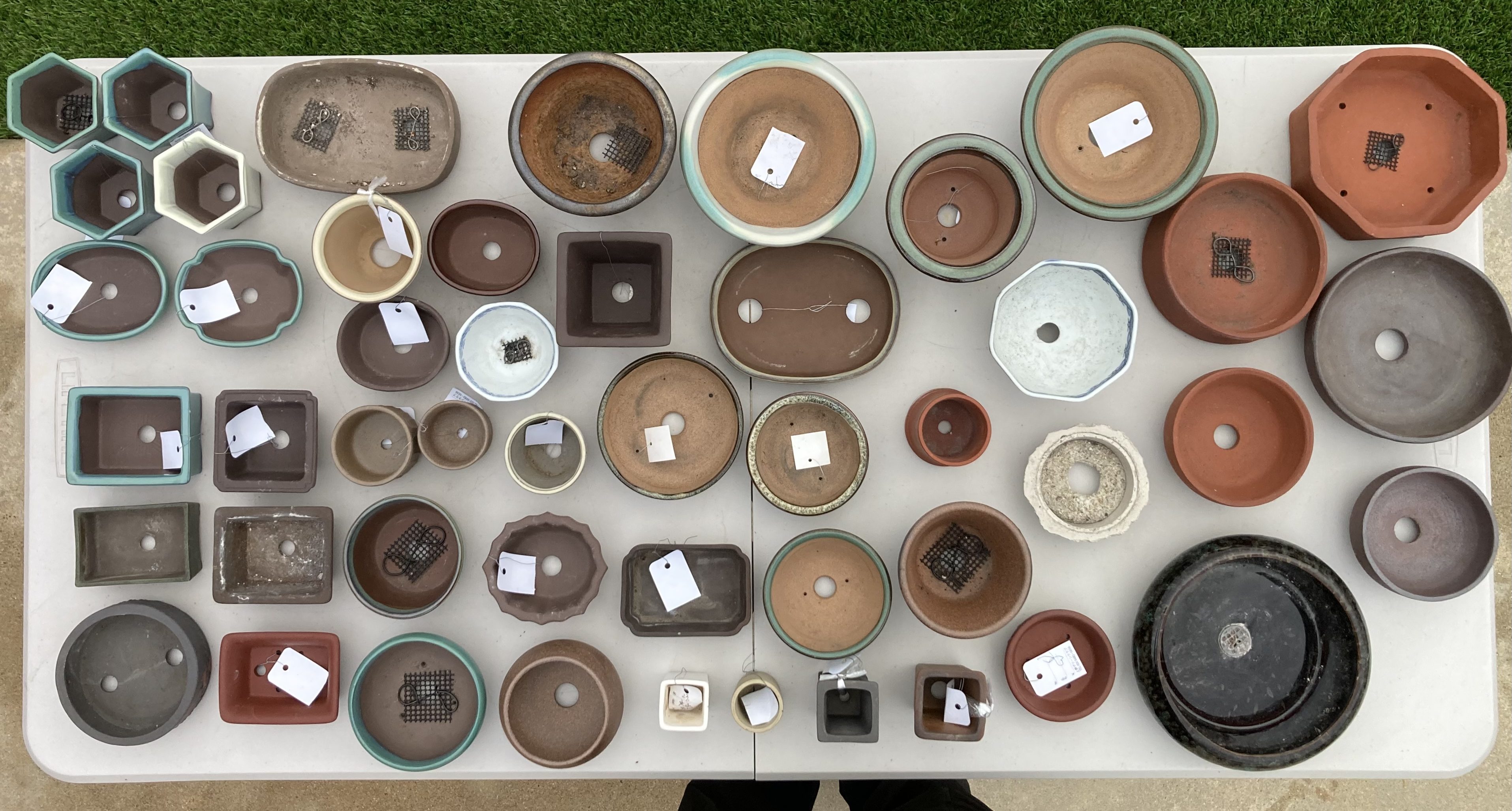 Bonsai pots on table
