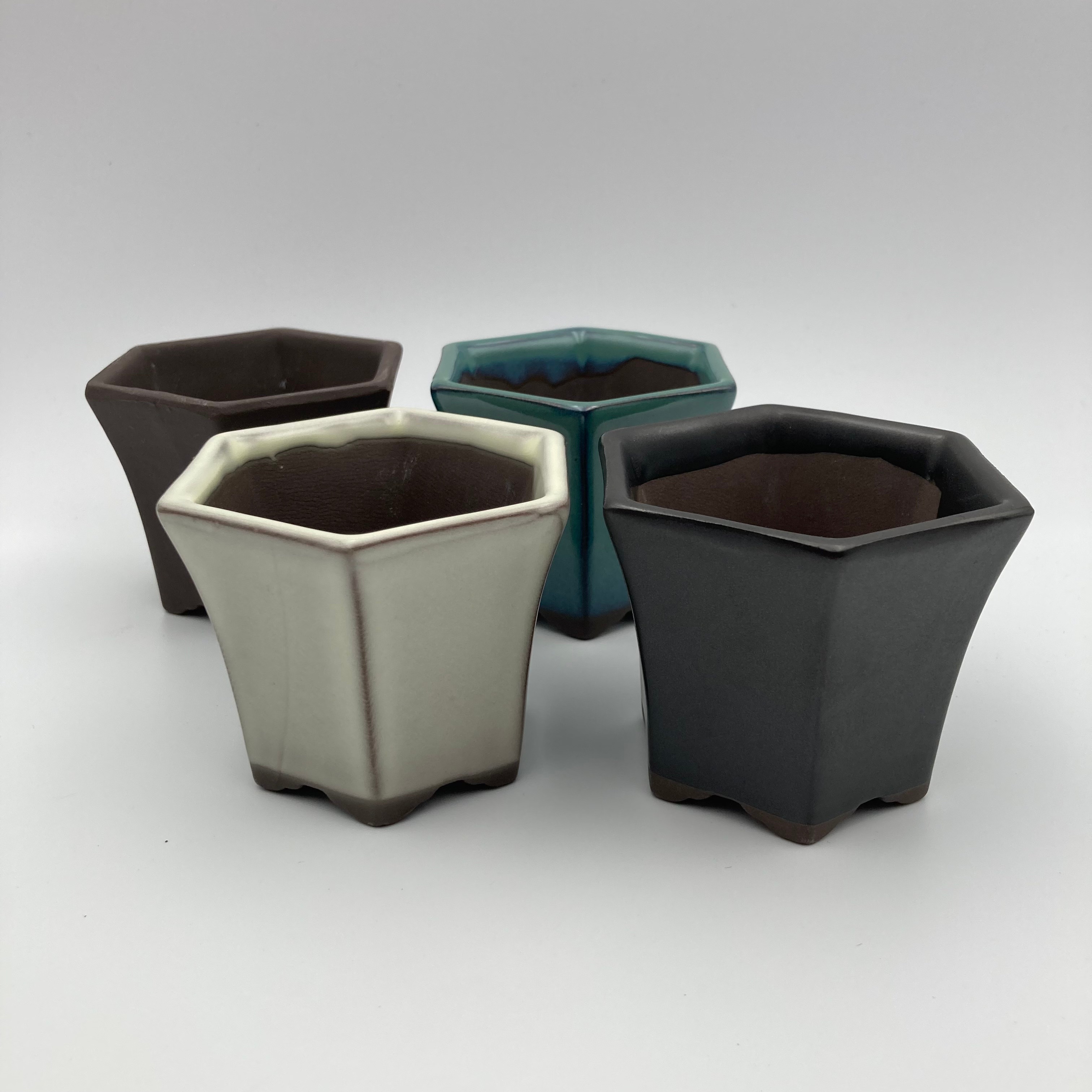 four hexagon bonsai pots